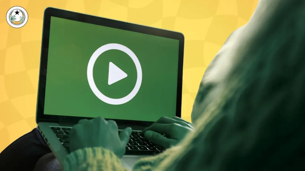 Ordinateur portable affichant un bouton de lecture vidéo, contenu en streaming